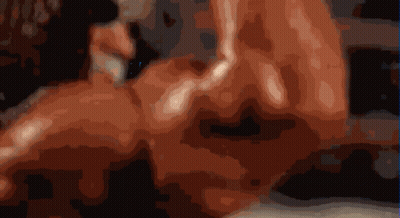 A Blurry Image Of A Person 'S Face With A Black Background GIF
