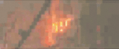 A Blurry Image Of A Person 'S Feet With A Light Coming Out Of Them GIF
