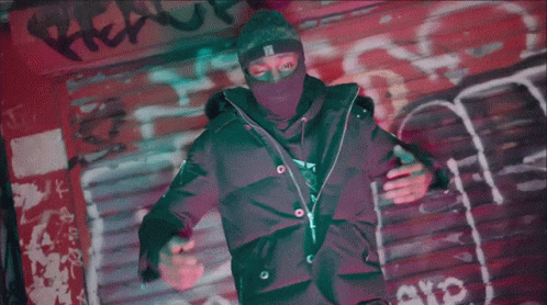 A Blurry Image Of A Person With A Red And Blue Stripe On Their Face GIF