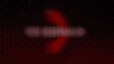 A Blurry Image Of The Word Champion On A Dark Background GIF