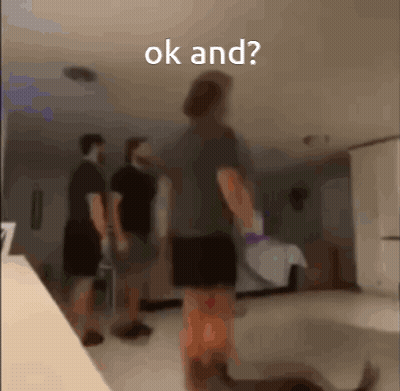 A Blurry Photo Of A Person Standing In A Room With The Words Ok And Written On The Bottom GIF