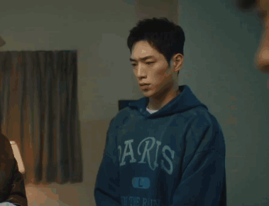 A Blurry Photo Of A Person Standing In A Room GIF