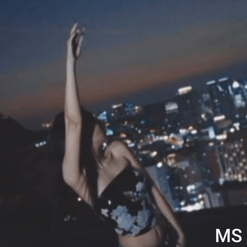 A Blurry Photo Of A Woman With The Letters Ms Visible GIF