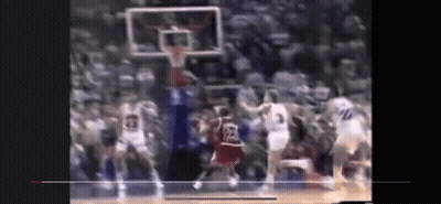 A Blurry Picture Of A Basketball Game With A Player Wearing A Jersey With The Number 23 On It . GIF