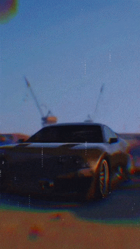 A Blurry Picture Of A Car On A Road GIF