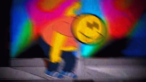 A Blurry Picture Of A Cartoon Character With A Smiley Face GIF