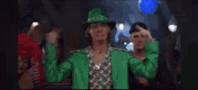 A Blurry Picture Of A Crowd Of People Dancing In A Bar . GIF