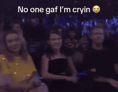 A Blurry Picture Of A Crowd With The Words No One Gaf I 'M Cryin GIF