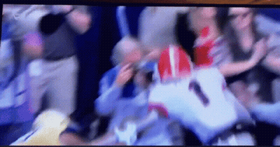 A Blurry Picture Of A Football Game With The Number 1 On The Back GIF