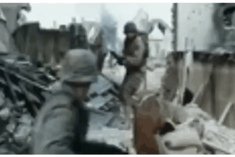 A Blurry Picture Of A Group Of Soldiers In A War Zone . GIF