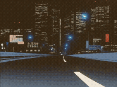 A Blurry Picture Of A Highway At Night With A Sign That Says U.s. Army GIF