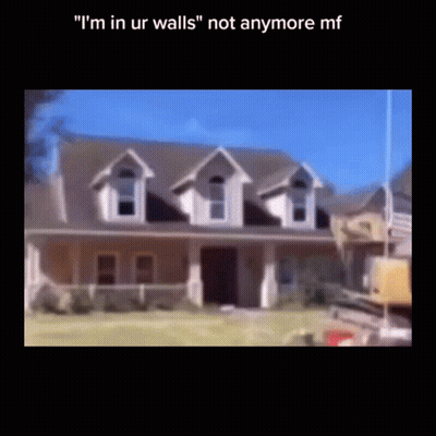 A Blurry Picture Of A House With The Words " I 'M In Ur Walls " On The Bottom GIF