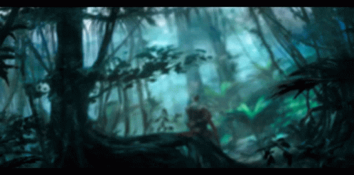 A Blurry Picture Of A Jungle With A Few Trees GIF