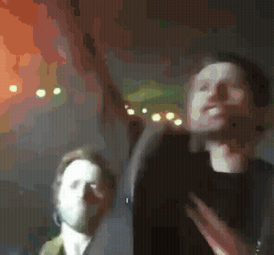 A Blurry Picture Of A Man And A Woman GIF