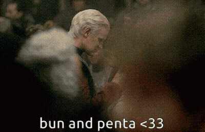 A Blurry Picture Of A Man And A Woman With The Words Bun And Penta < 33 GIF