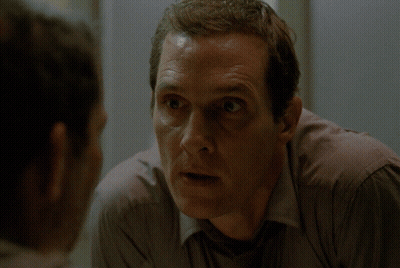 A Blurry Picture Of A Man Being Punched In The Face By Another Man GIF