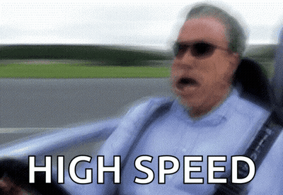 A Blurry Picture Of A Man Driving A Car With The Words High Speed Written Below Him GIF