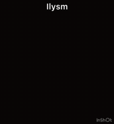 A Blurry Picture Of A Man Holding A Red Rose With The Word Illysm Written On The Bottom GIF