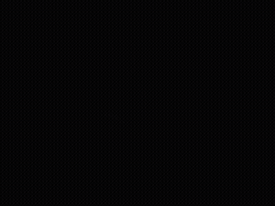 A Blurry Picture Of A Man In A Car With A Purple Light On The Dashboard GIF
