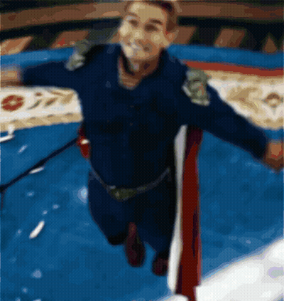 A Blurry Picture Of A Man In A Superhero Outfit GIF