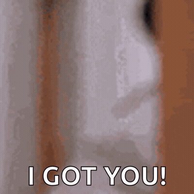A Blurry Picture Of A Man Laying In Bed With The Words `` I Got You '' Written On The Bottom . GIF