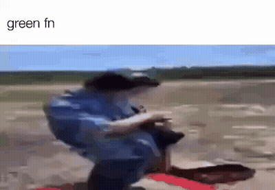 A Blurry Picture Of A Man Riding A Scooter On A Dirt Road . GIF