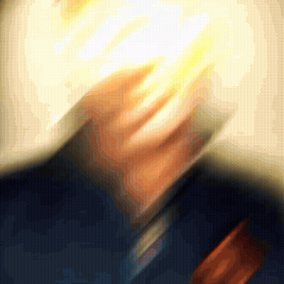 A Blurry Picture Of A Man 'S Face With A Light Coming Out Of It GIF