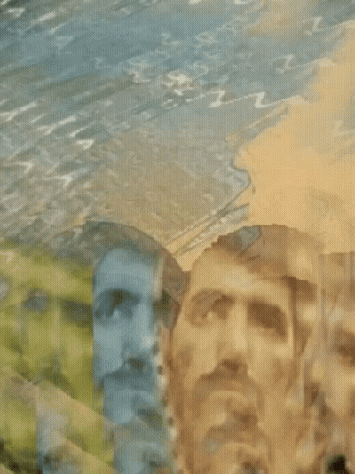 A Blurry Picture Of A Man 'S Face With The Letter Z On The Bottom GIF