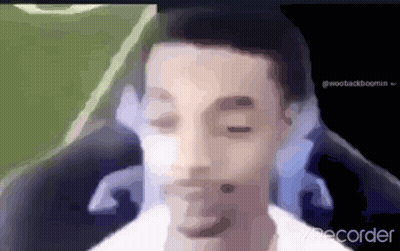 A Blurry Picture Of A Man 'S Face With The Word Recorder In The Corner . GIF