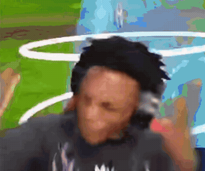 A Blurry Picture Of A Man Wearing Headphones And A Shirt That Says ' Mv ' On It GIF