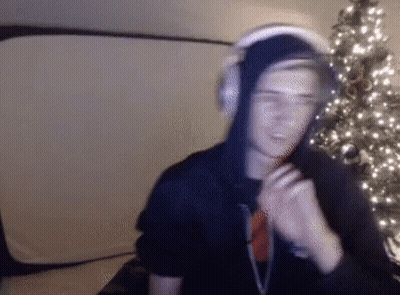 A Blurry Picture Of A Man Wearing Headphones GIF
