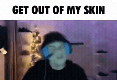 A Blurry Picture Of A Man With Headphones And The Words Get Out Of My Skin GIF