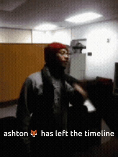 A Blurry Picture Of A Man With The Words Ashton Has Left The Timeline GIF