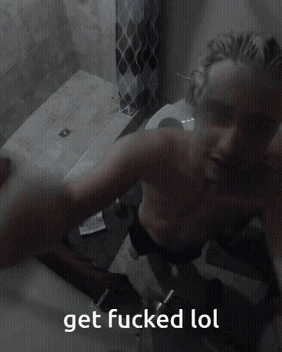 A Blurry Picture Of A Man With The Words Get Fucked Lol Written Below Him GIF