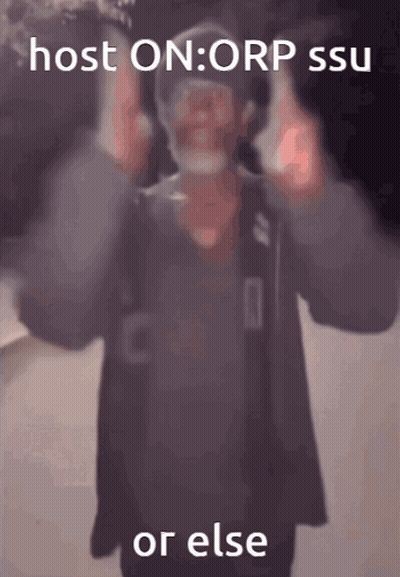 A Blurry Picture Of A Man With The Words " Host On Orp Ssu Or Else " On The Bottom GIF