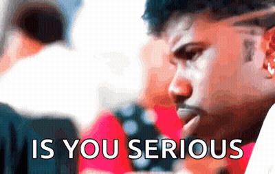 A Blurry Picture Of A Man With The Words " Is You Serious " On The Bottom GIF