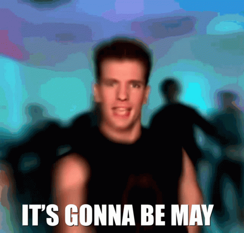 A Blurry Picture Of A Man With The Words It 'S Gonna Be May On The Bottom GIF