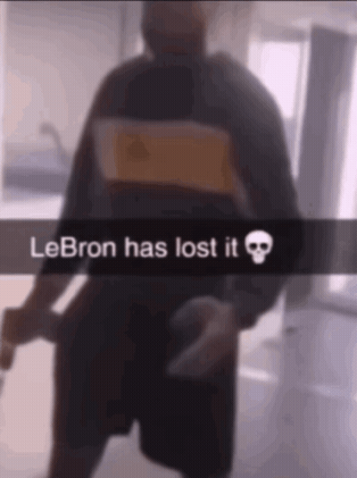 A Blurry Picture Of A Man With The Words Lebron Has Lost It On It GIF