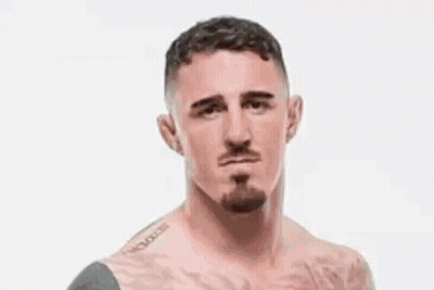 A Blurry Picture Of A Man With The Words " Stop Ducking And Fight Gane " Above Him GIF