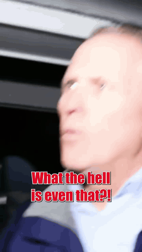 A Blurry Picture Of A Man With The Words " What The Hell Is Even That " GIF