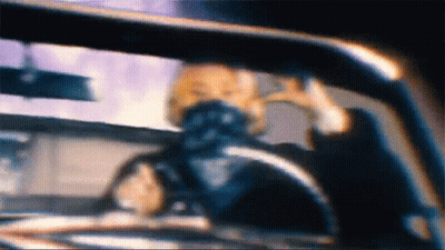 A Blurry Picture Of A Person In A Car GIF