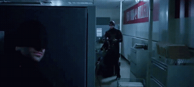 A Blurry Picture Of A Person In A Dark Room GIF