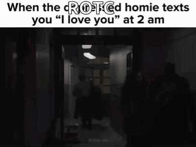 A Blurry Picture Of A Person In A Dark Room With The Words `` I Love You '' Written On It . GIF