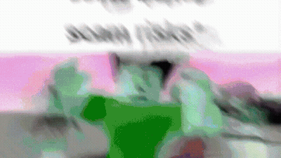 A Blurry Picture Of A Person In A Green Shirt And A Pink Background That Says ' I Love You ' GIF