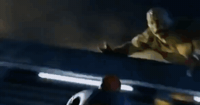 A Blurry Picture Of A Person In A Superhero Suit GIF