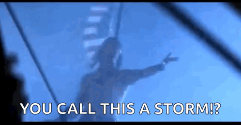 A Blurry Picture Of A Person Pointing At The Sky With The Words `` You Call This A Storm '' GIF