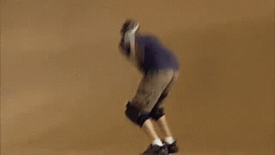 A Blurry Picture Of A Person Riding A Bike On A Dirt Track GIF
