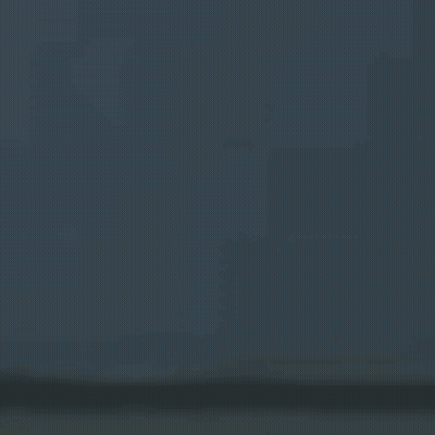 A Blurry Picture Of A Person 'S Face With A Bat On It 'S Head . GIF