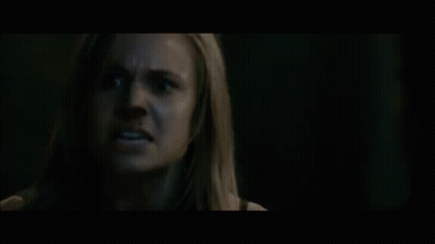 A Blurry Picture Of A Person 'S Face With A Black Background . GIF