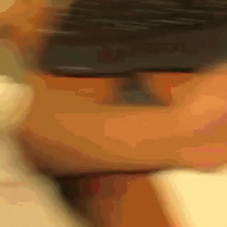 A Blurry Picture Of A Person 'S Face With A Blurred Background GIF